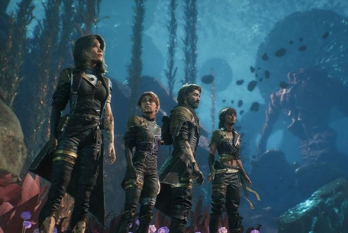 2025-game-releases-clair-obscur-expedition-33 Four characters dressed in black standing in an underwater world.